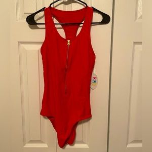 Red one piece swim suit with gold zipper front